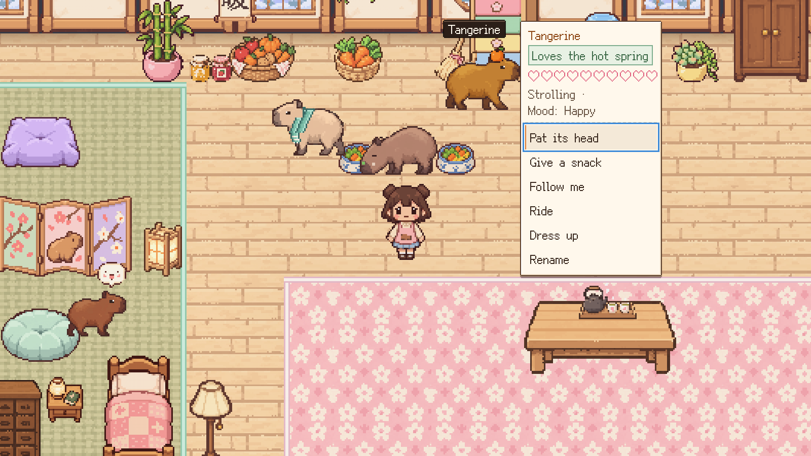 Inside the pet shop at breakfast: capybaras round their bowls and a small menu open beside one of them